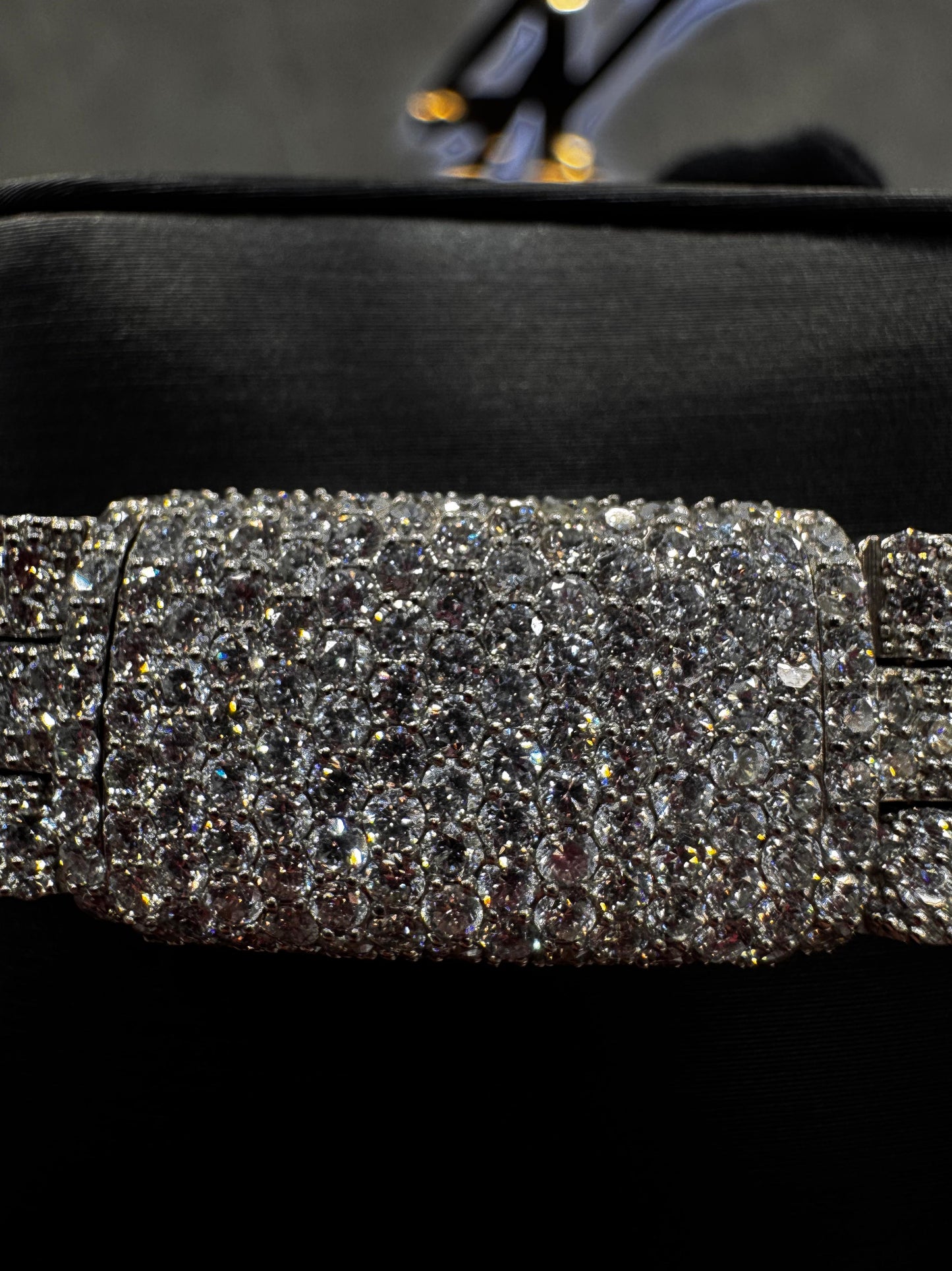 Close-up view of a diamond-encrusted Miami Cuban bracelet, highlighting the brilliance and clarity of each individually set stone.