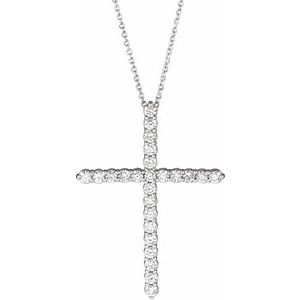 Sterling silver cross necklace featuring 1 carat total weight of natural diamonds in a radiant, faith-inspired design