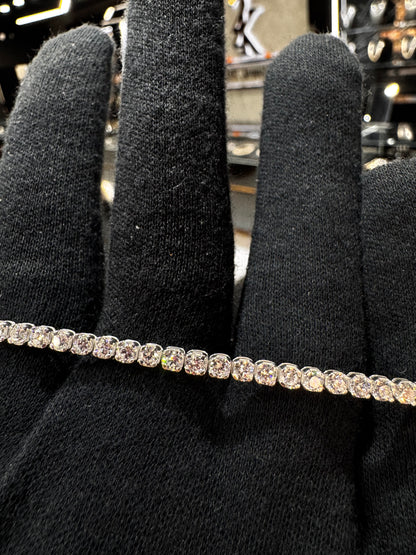 Close-up of .925 sterling silver lab diamond tennis bracelet showcasing sparkling stones and fine craftsmanship