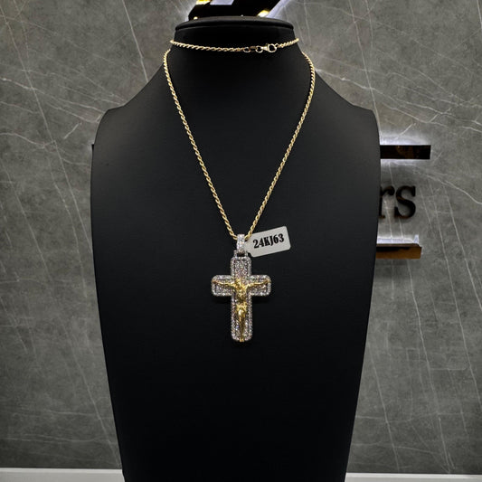  “Invisible set diamond cross pendant with seamless round-cut stones in a polished 14K gold setting.”