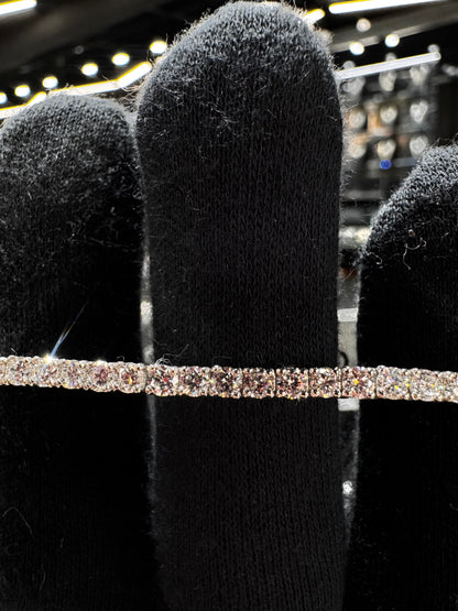 Close-up of .925 silver 7 pointer lab diamond tennis bracelet highlighting the brilliance of each lab diamond and fine silver craftsmanship.