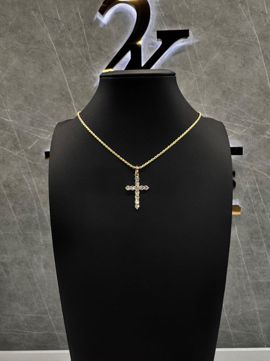 “Elegant 14K gold cross pendant set with 15-point round diamonds, offering a sleek and minimalist take on a timeless symbol of faith and style.”