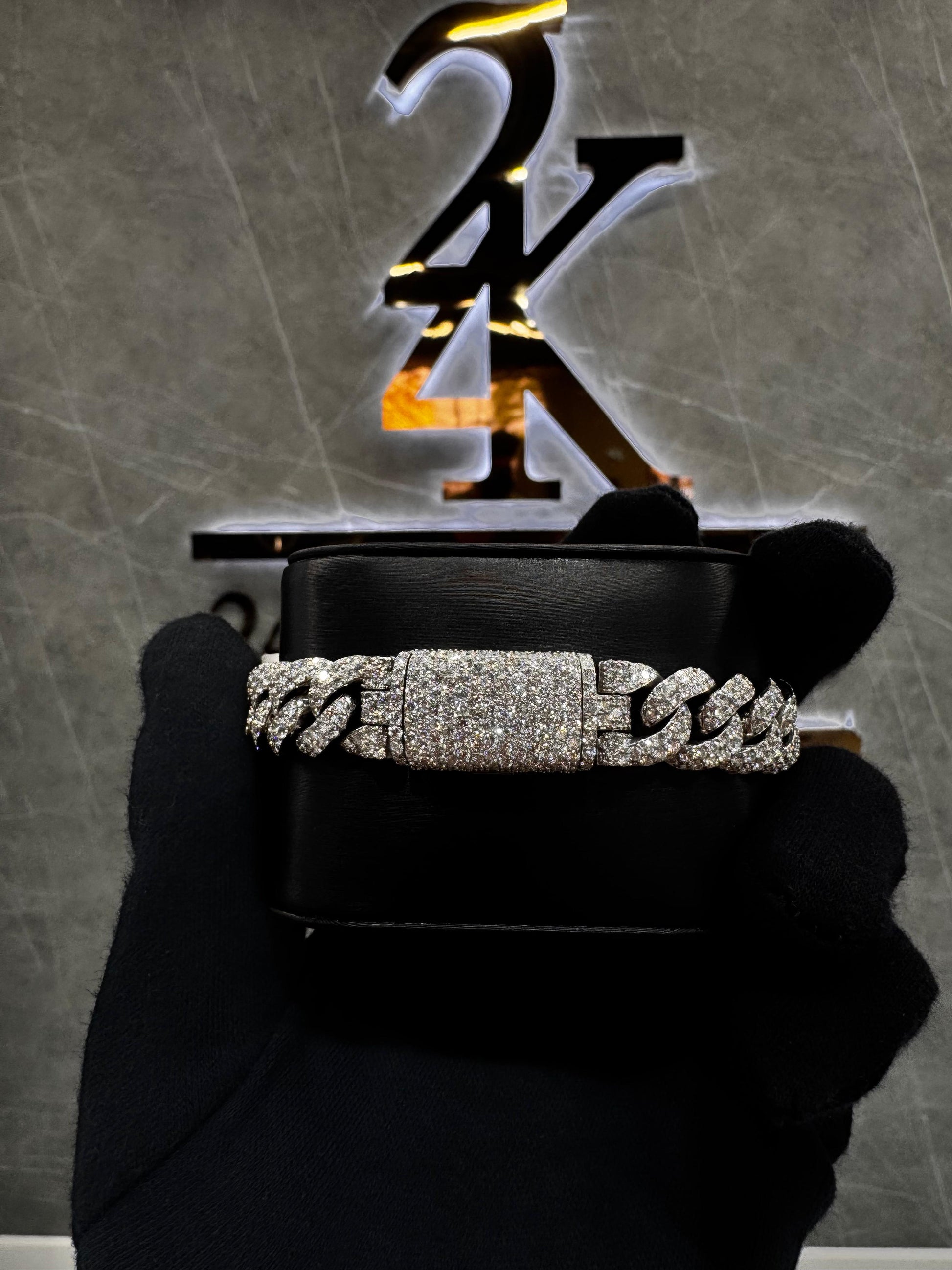 Diamond Miami Cuban link bracelet displayed on a black velvet surface, showcasing its intricate design and high-quality craftsmanship.