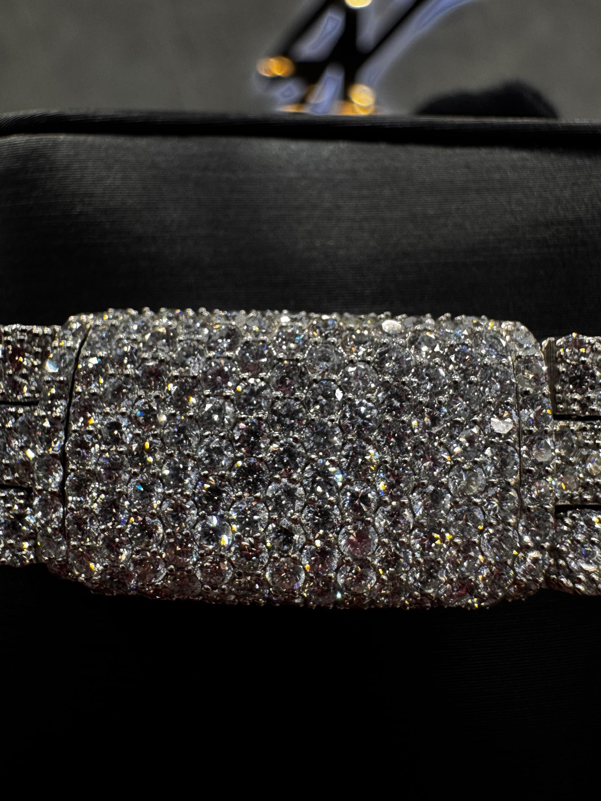 Close-up view of a diamond-encrusted Miami Cuban bracelet, highlighting the brilliance and clarity of each individually set stone.