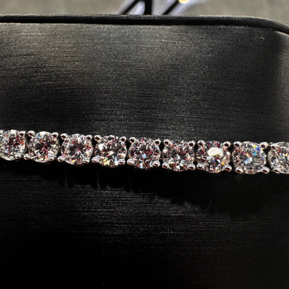 “Close-up of 25 pointer diamond tennis bracelet featuring round brilliant-cut stones in 14K gold with precise prong setting and high-polish finish.”